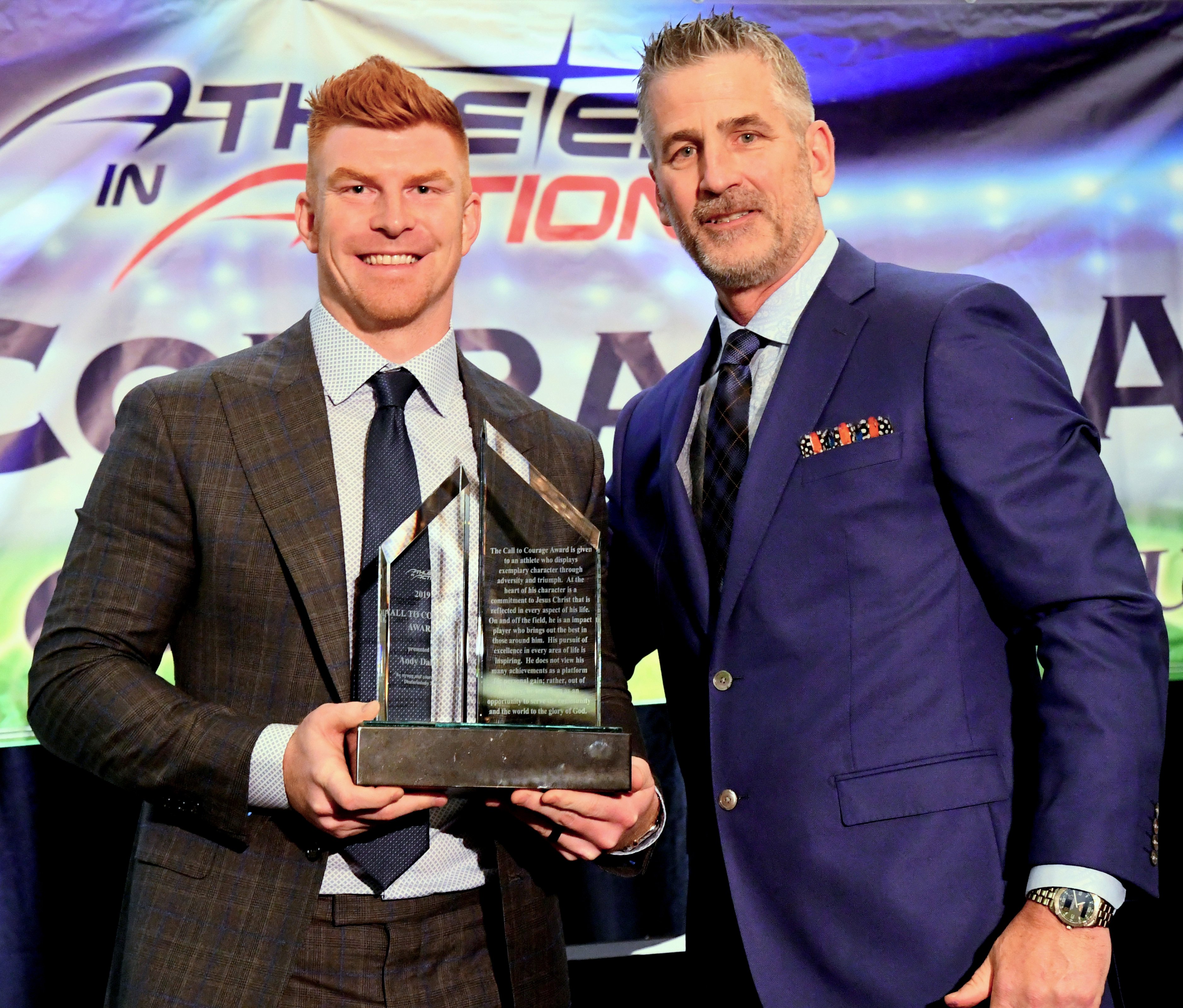 Buffalo Bills Alumni & Head Coach of the Indianapolis Colts Frank Reich presents the 2019 Call to Courage Award to Cincinnati Bengals QB Andy Dalton